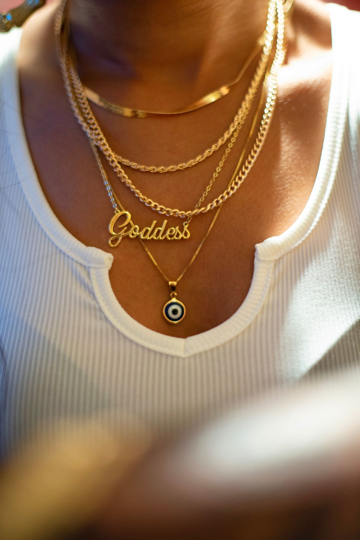 Layer your choker into a cascading necklace stack for a soft, curated look.