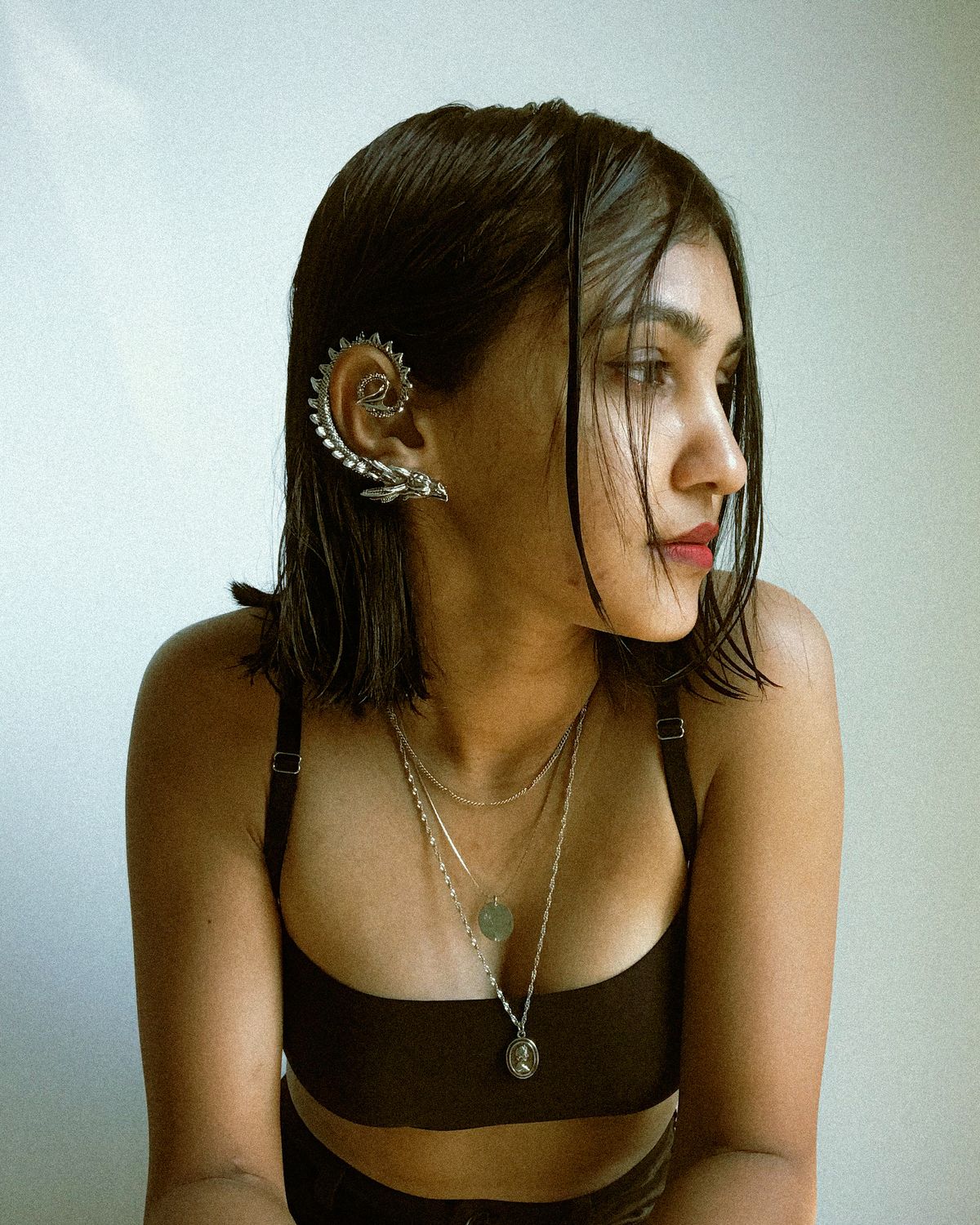 Clip-on ear cuffs complete the illusion of a full professional ear stack without extra piercings.