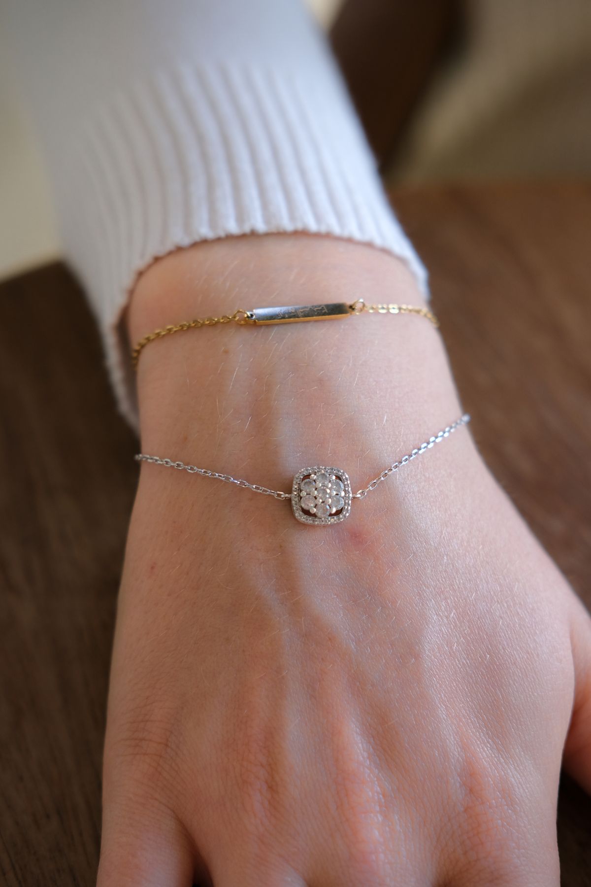 A tennis bracelet lies flat against the wrist — it never gets in the way at the office.