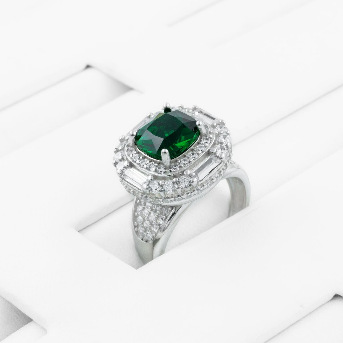 An emerald green ring brings a sense of calm and centeredness to a busy day.