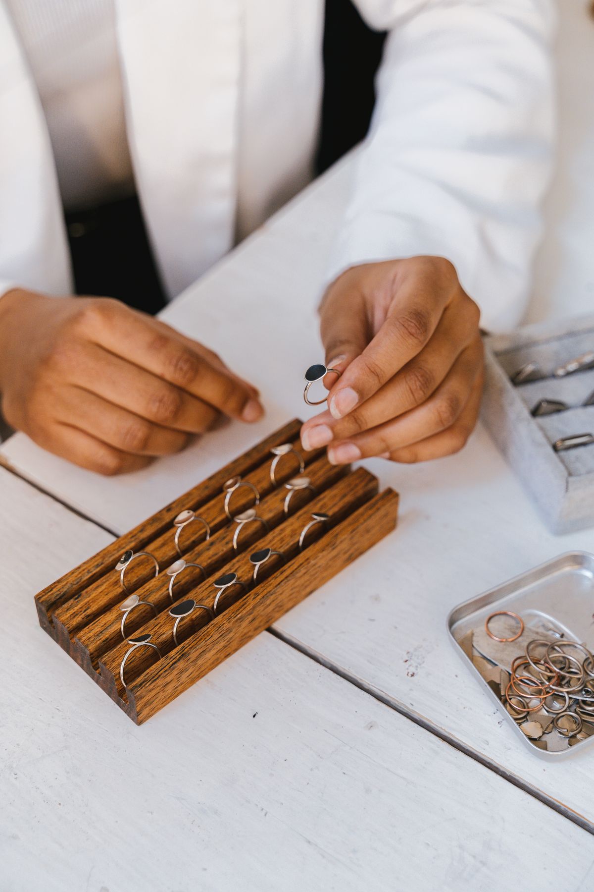 Store small studs and rings in a compact travel case or pill organizer.