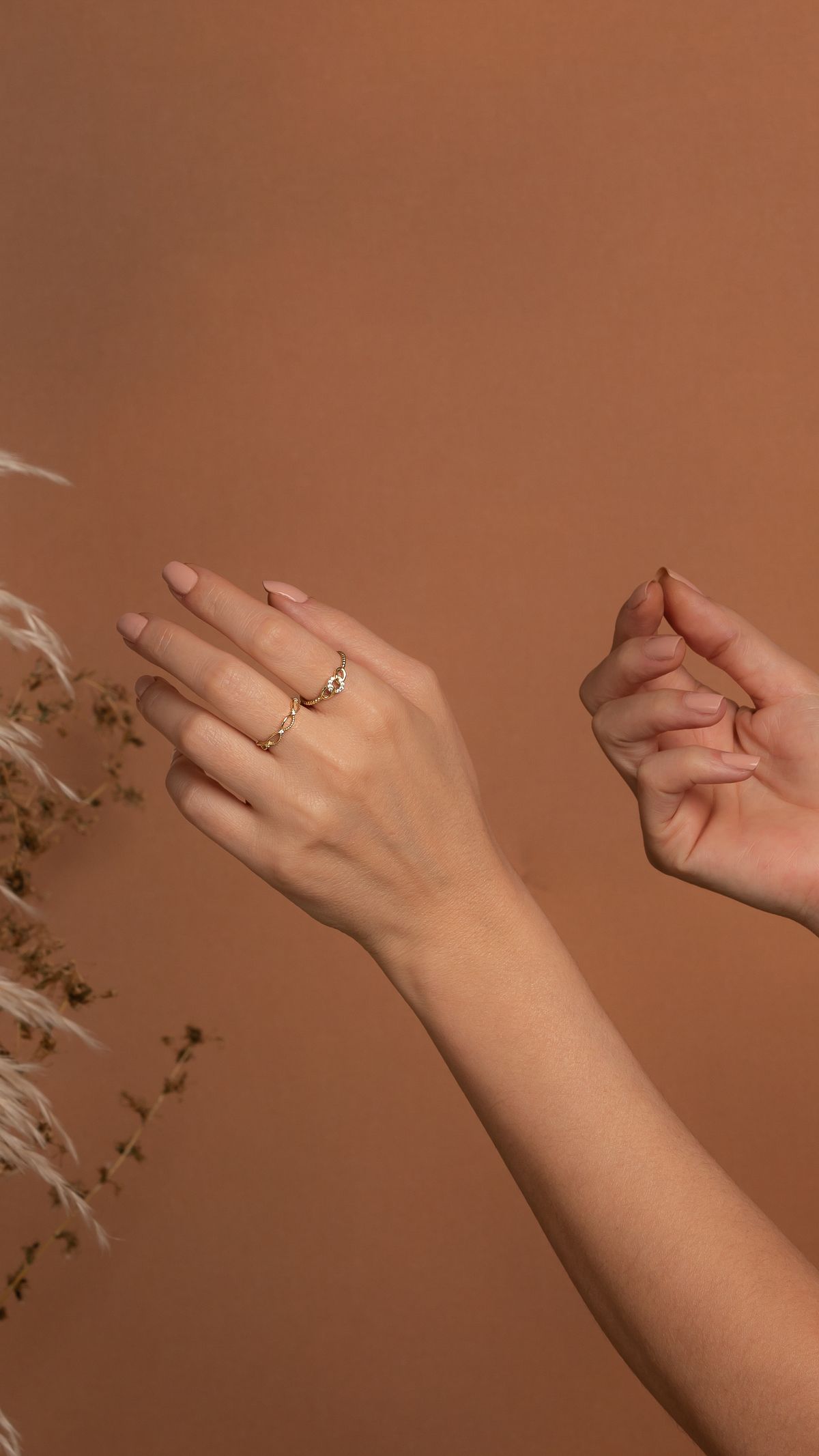 Leave negative space between stacked fingers to keep hands looking elongated and elegant.
