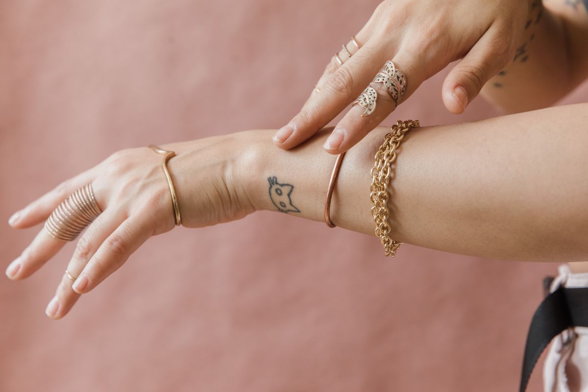 Short sleeves leave your entire arm exposed — a clean canvas for bolder wristwear.