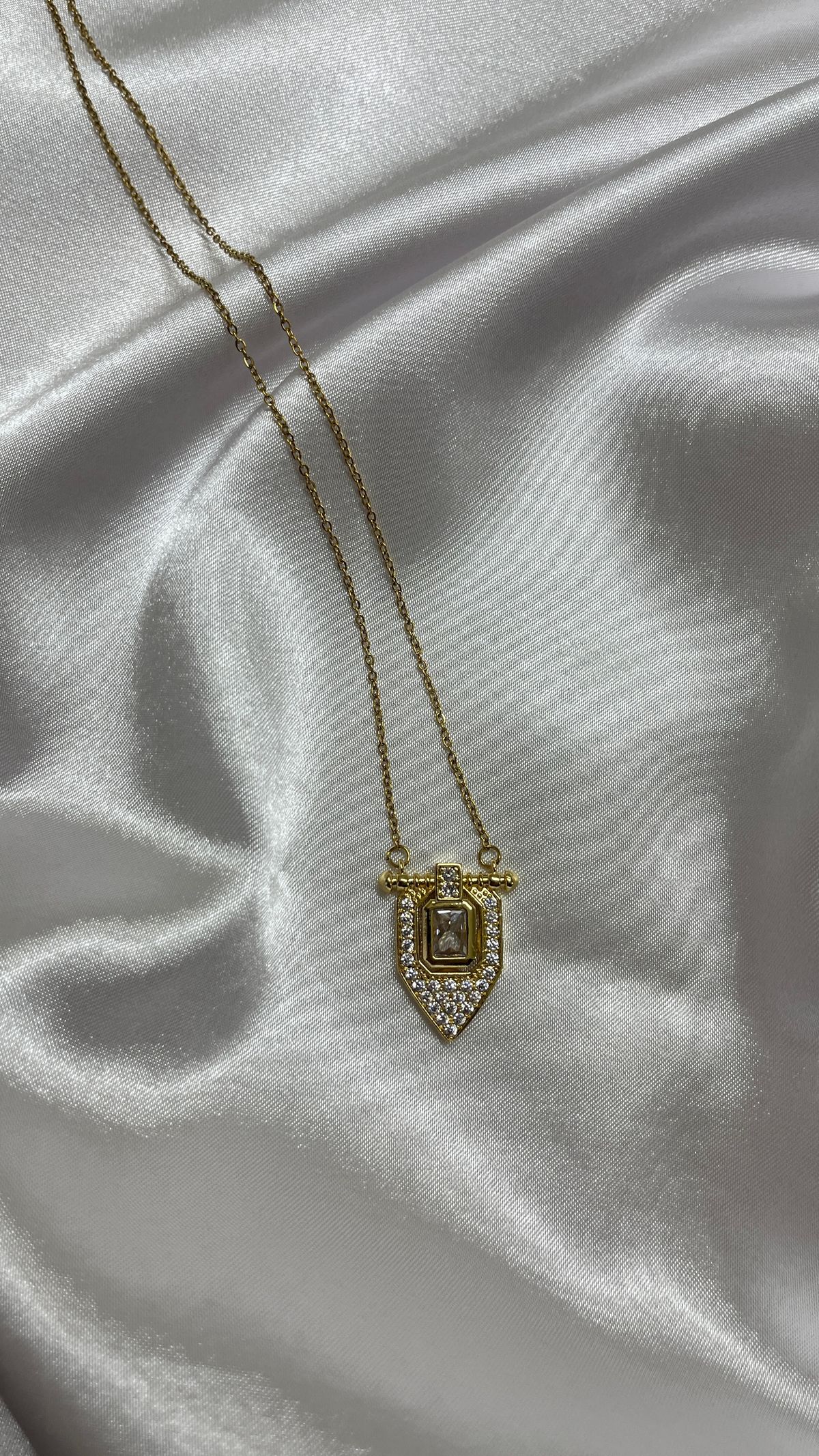 An initial or birthstone pendant keeps her child close to her heart every day.